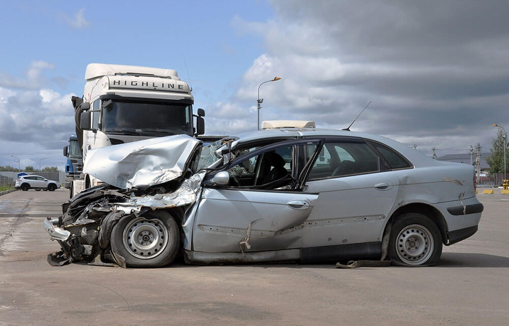 driver standing having neck pain after car accident